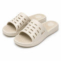 Chanclas de baño talla 38/39 de espuma sintética color crema con suela de masaje antideslizante